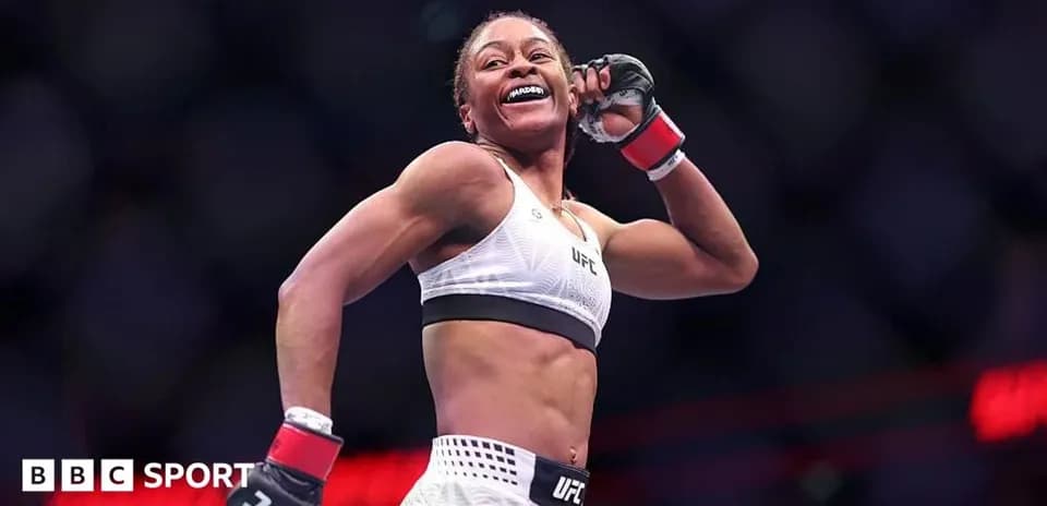 UFC fighter celebrating victory in the octagon