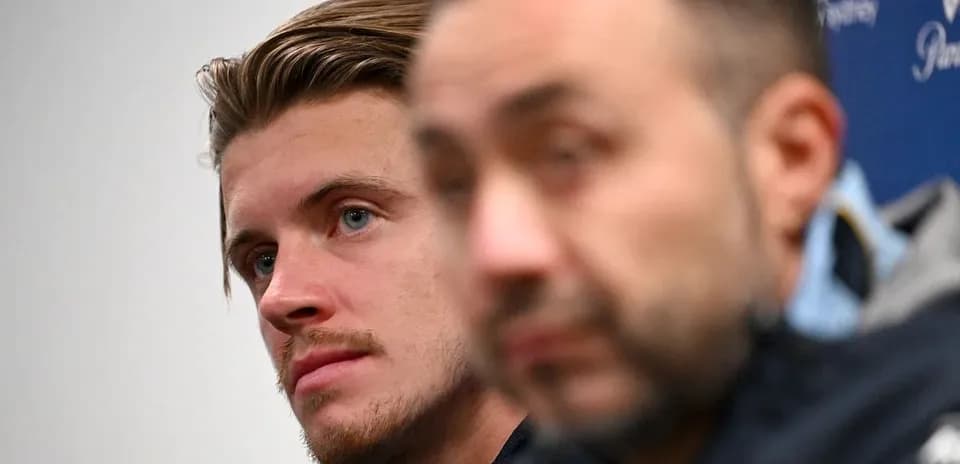 Press conference with two speakers in focus