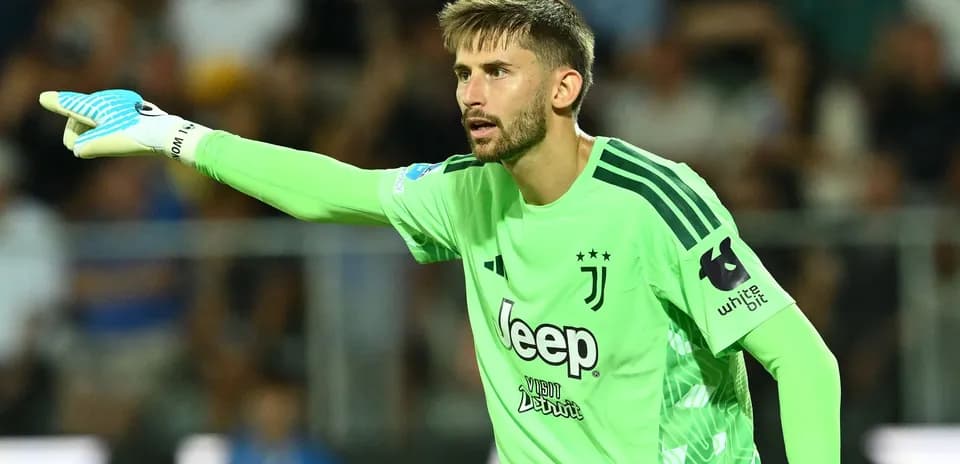 Juventus goalkeeper directing teammates during match