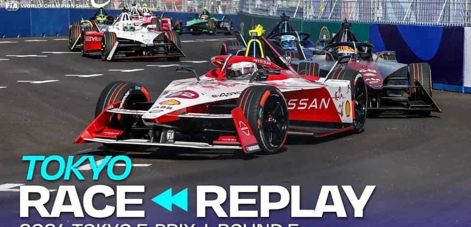 Formula E cars racing during Tokyo E-Prix event