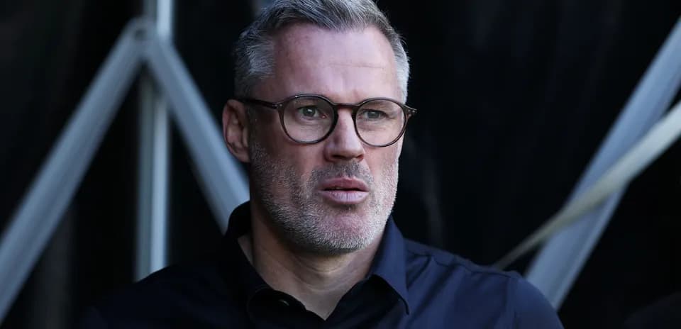 Man with glasses looking attentively off-camera