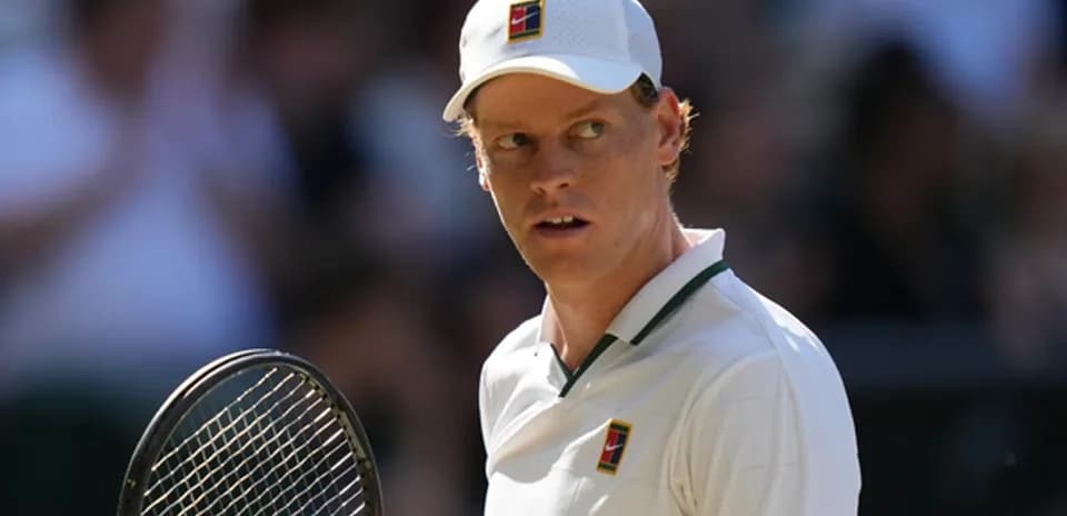 Tennis player holding racket during match