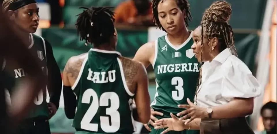 Nigeria women's basketball team discussing strategy during timeout