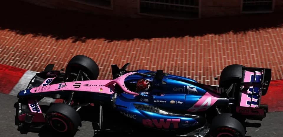 Formula 1 car racing on a street circuit