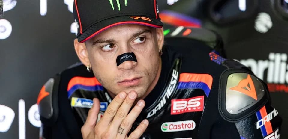 Motorsport athlete preparing in team garage