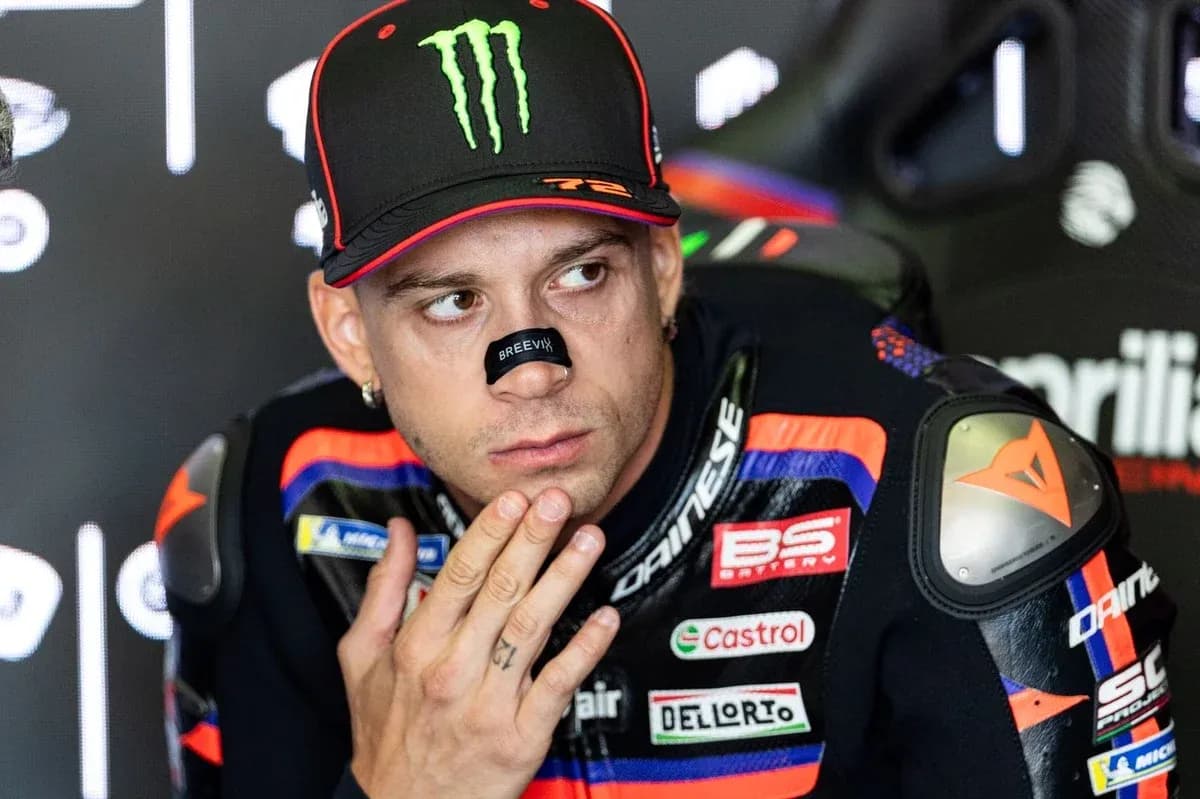 Motorsport athlete preparing in team garage