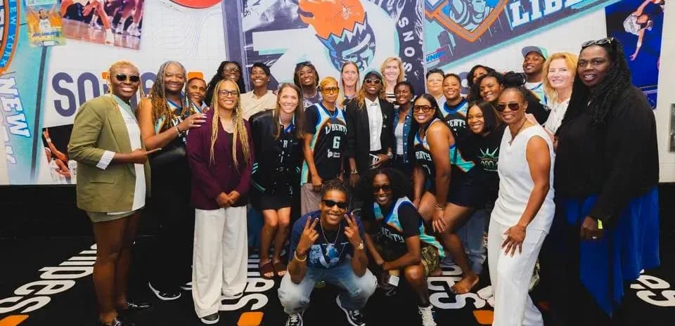 Group photo of New York Liberty fans and players