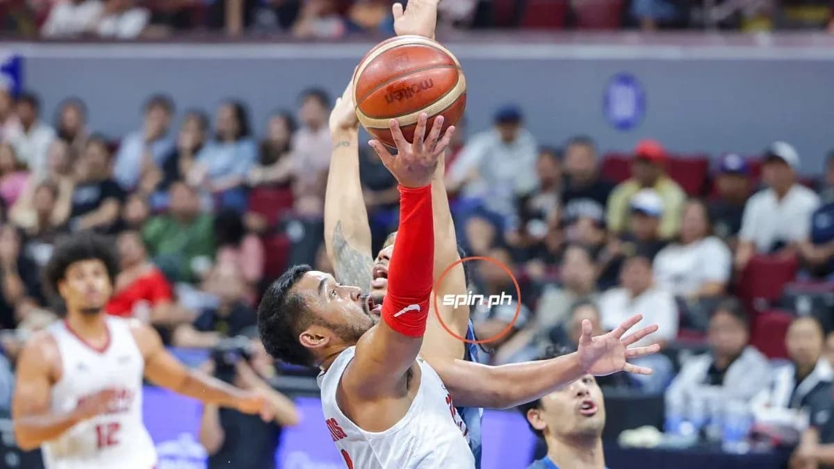 Player attempting a shot during basketball game