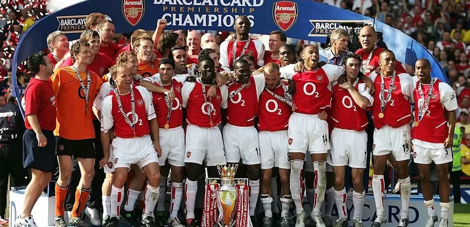 Arsenal team celebrating Barclays Premier League victory