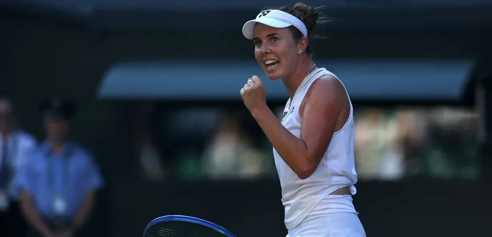 Tennis player celebrating a point during match