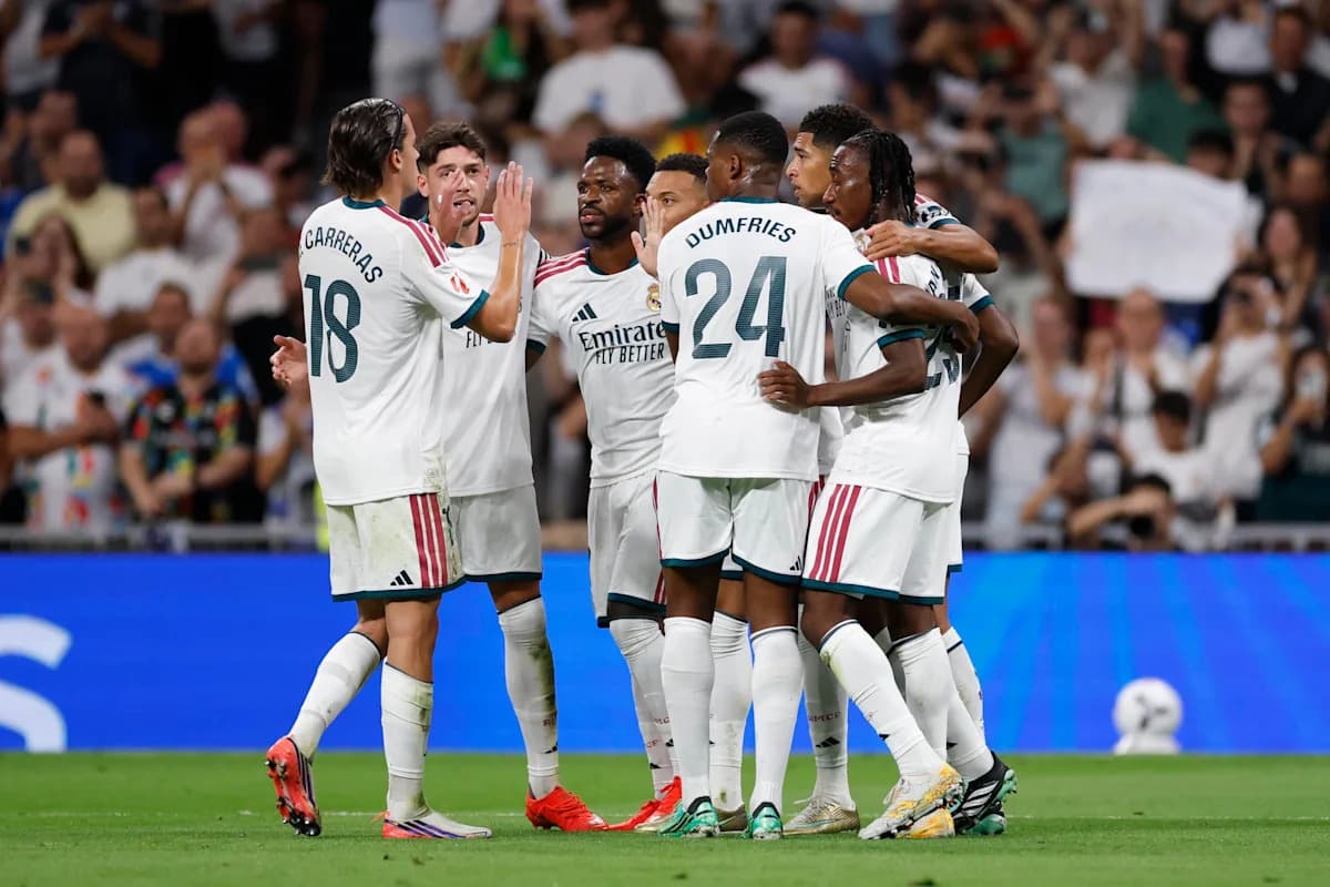 Real Madrid players celebrating a goal together