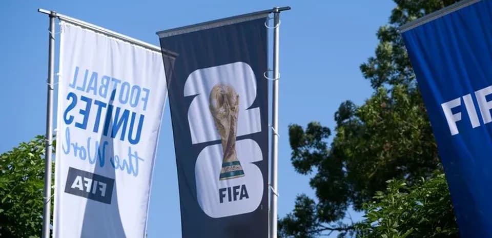 FIFA World Cup trophy displayed on banners