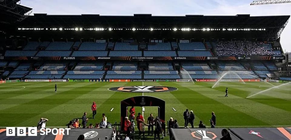Stadium with UEFA Europa League logo and fans