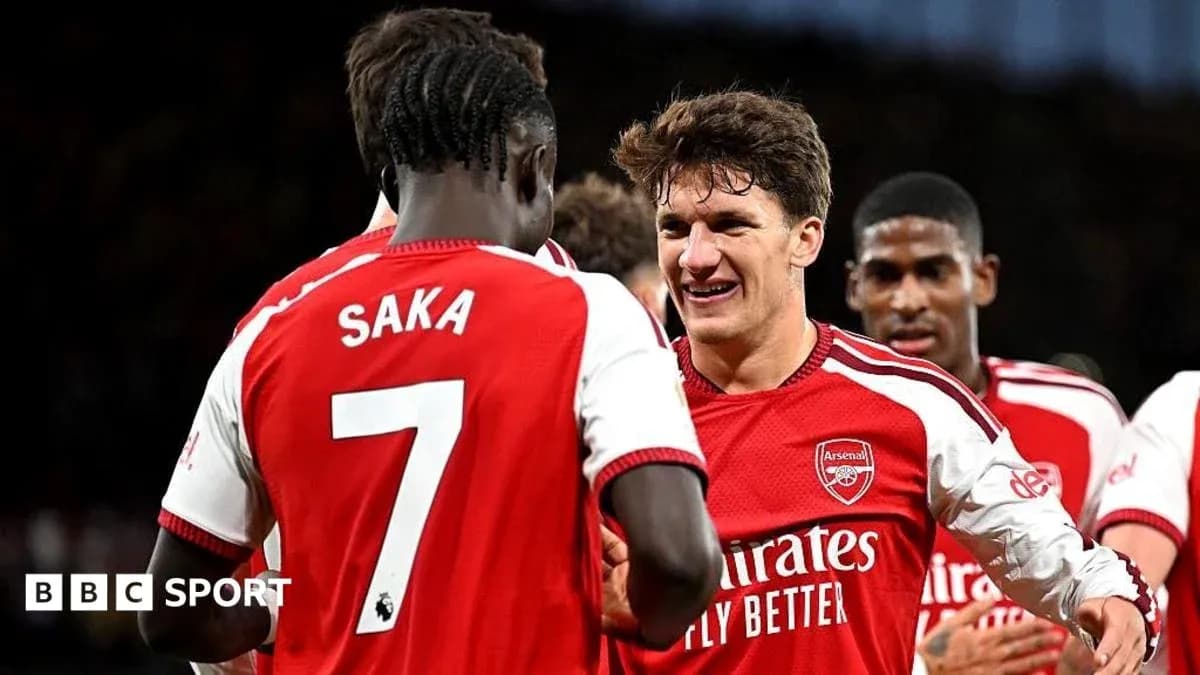 Arsenal players celebrating a goal during match