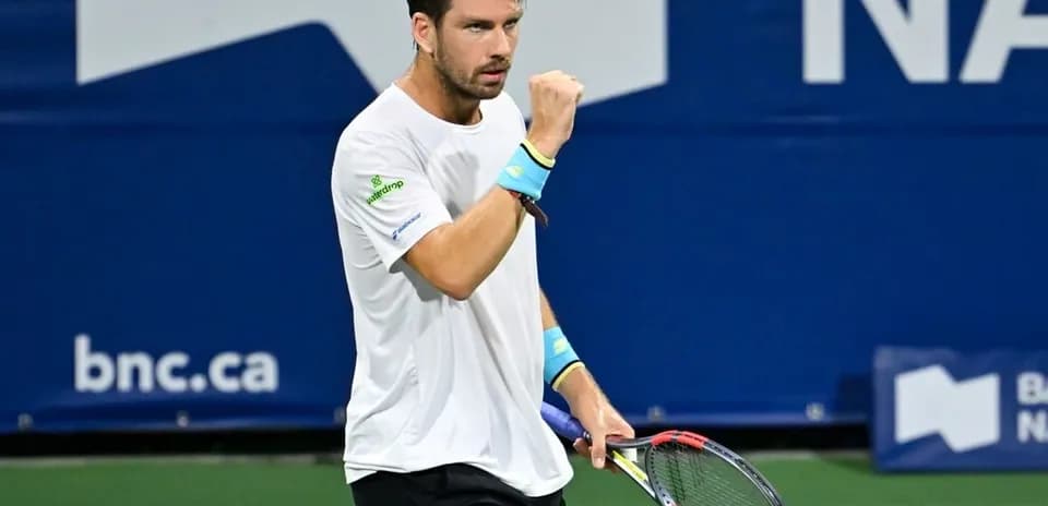 Tennis player celebrating a point during match