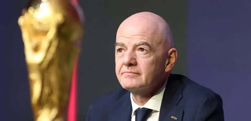 FIFA president with World Cup trophy during event
