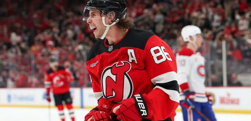 Hockey player celebrating in New Jersey Devils jersey