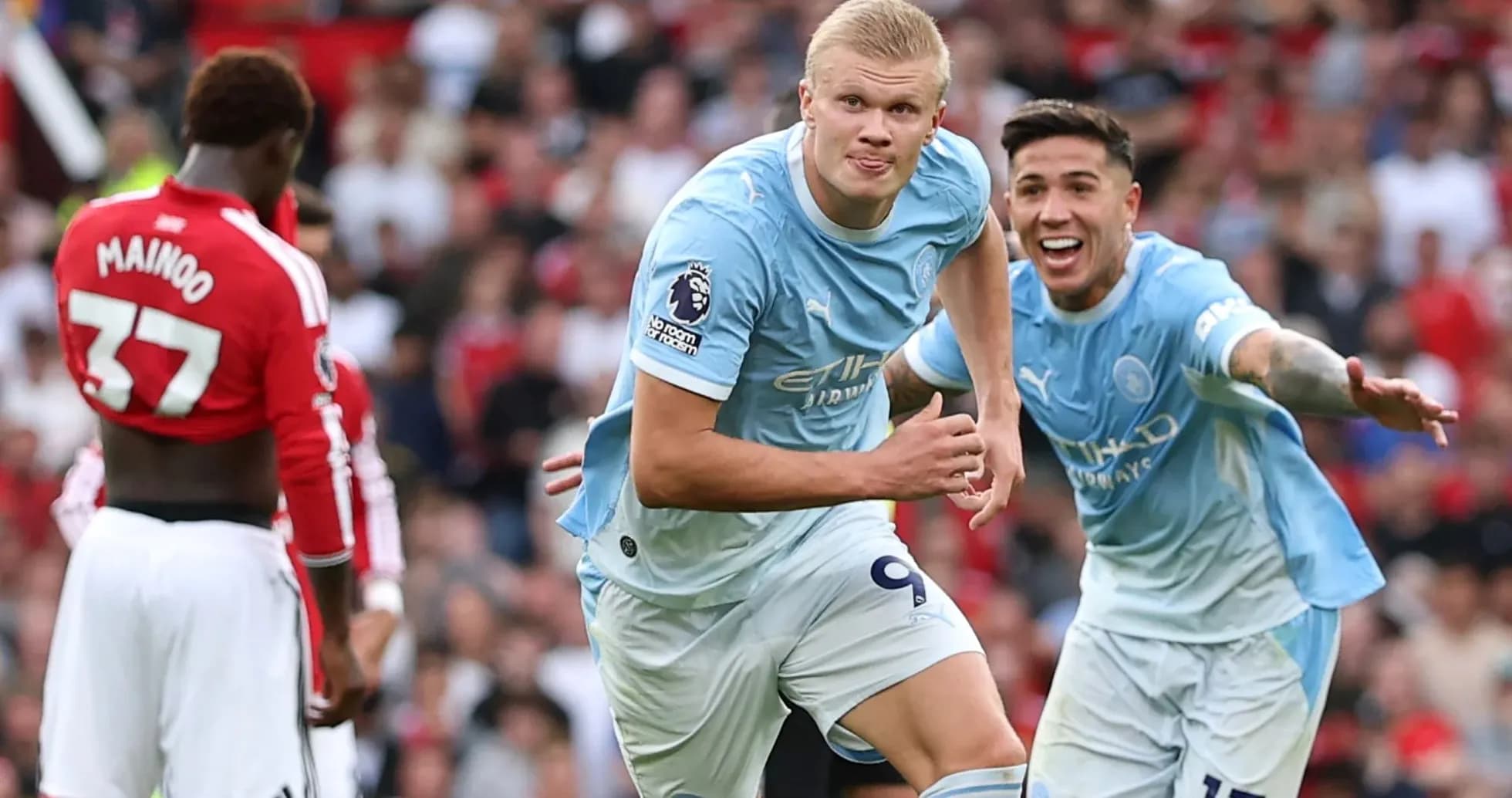 Erling Haaland celebrating a goal with teammates