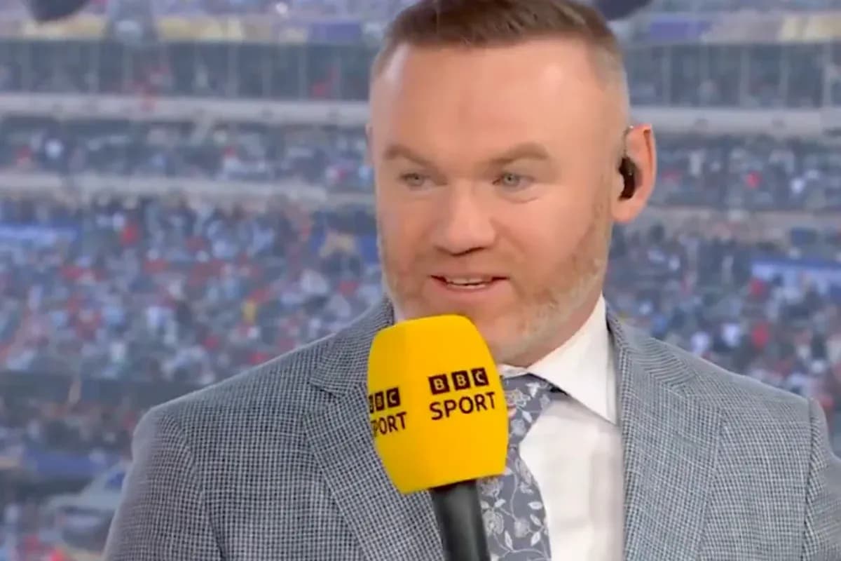 Sport commentator speaking with microphone at event