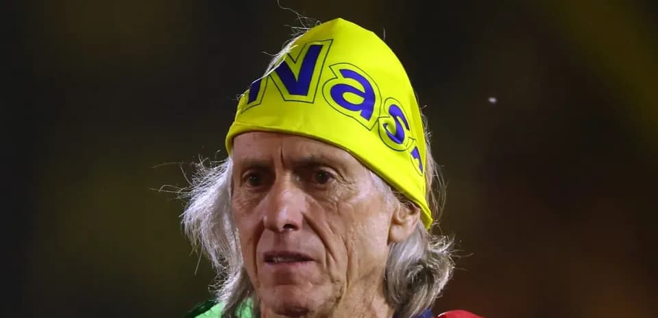 Fan wearing yellow bandana at sports event