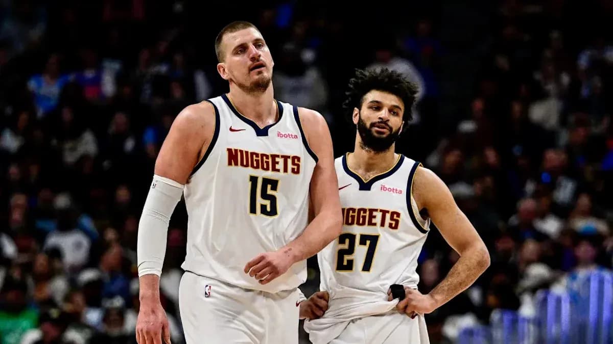 Denver Nuggets players walking off the court