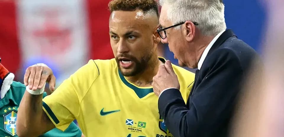 Neymar discussing tactics with coach during match