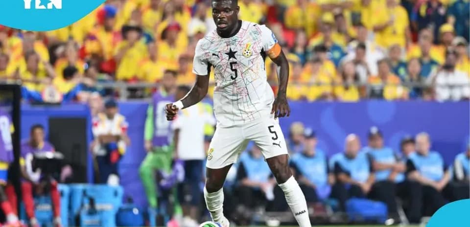 Ghana player dribbling during a football match
