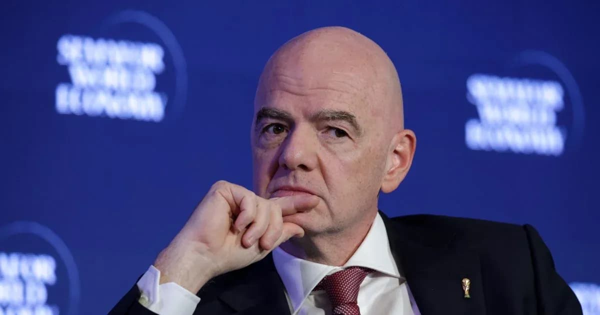Man pondering during a conference discussion
