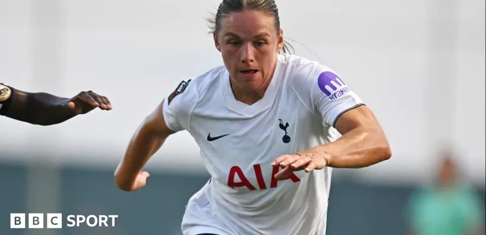 Tottenham player sprinting during a match action