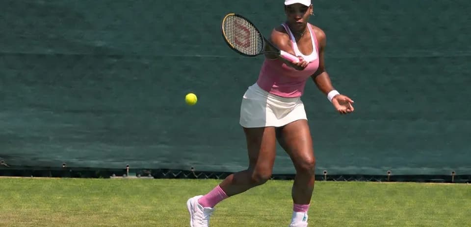 Tennis player hitting a forehand shot on court