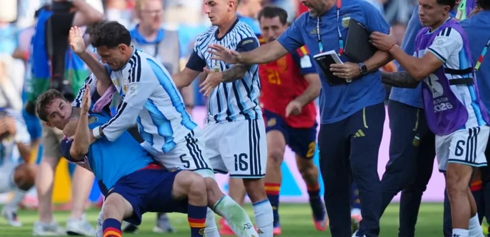 Players and staff involved in a scuffle on field