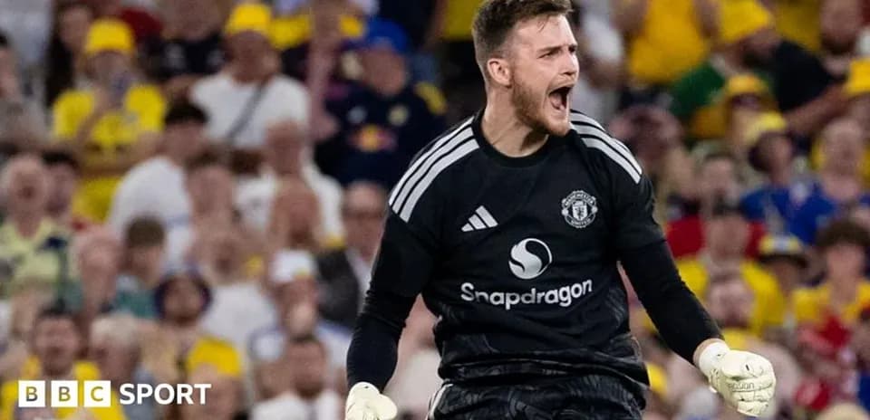 Manchester United goalkeeper celebrating in front of fans