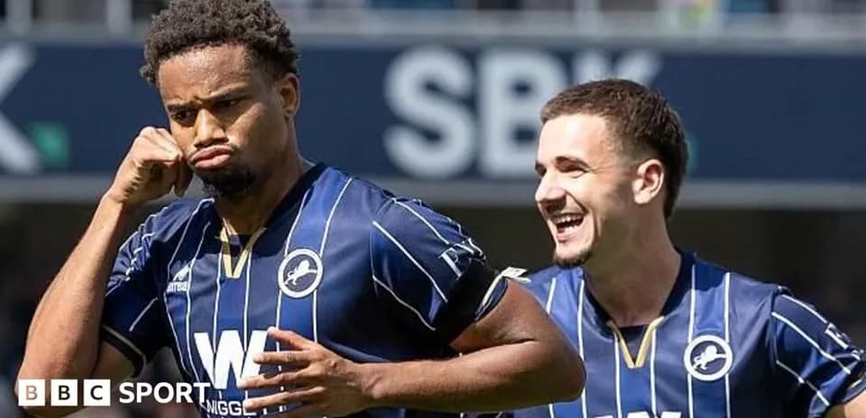 Millwall players celebrating a goal on the field