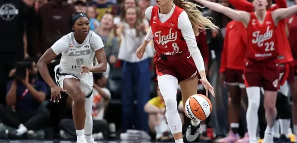 Indy player dribbling ball during game against Aces