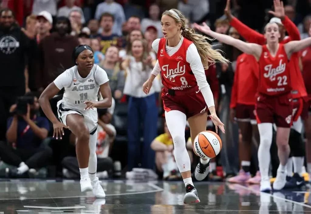 Indy player dribbling ball during game against Aces