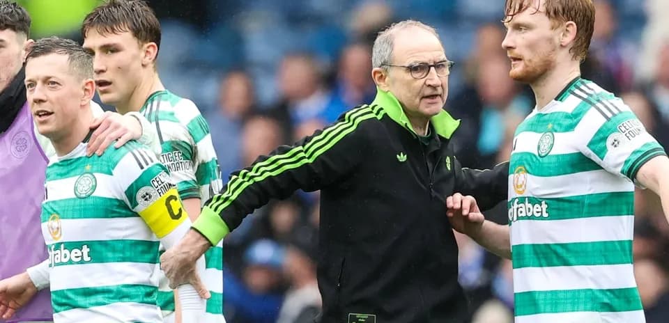 Celtic players and coach discussing during match