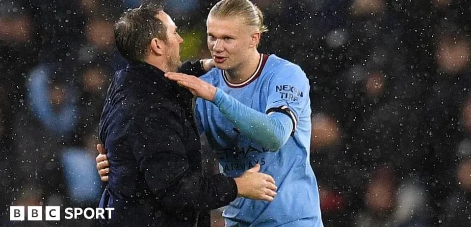 Erling Haaland and coach discussing after match