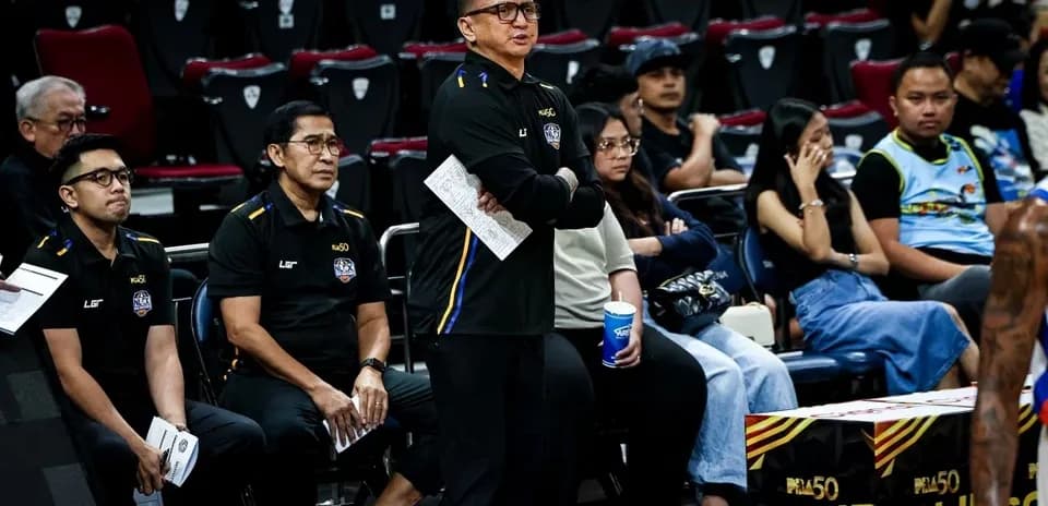Coaches observing game from the sidelines during match