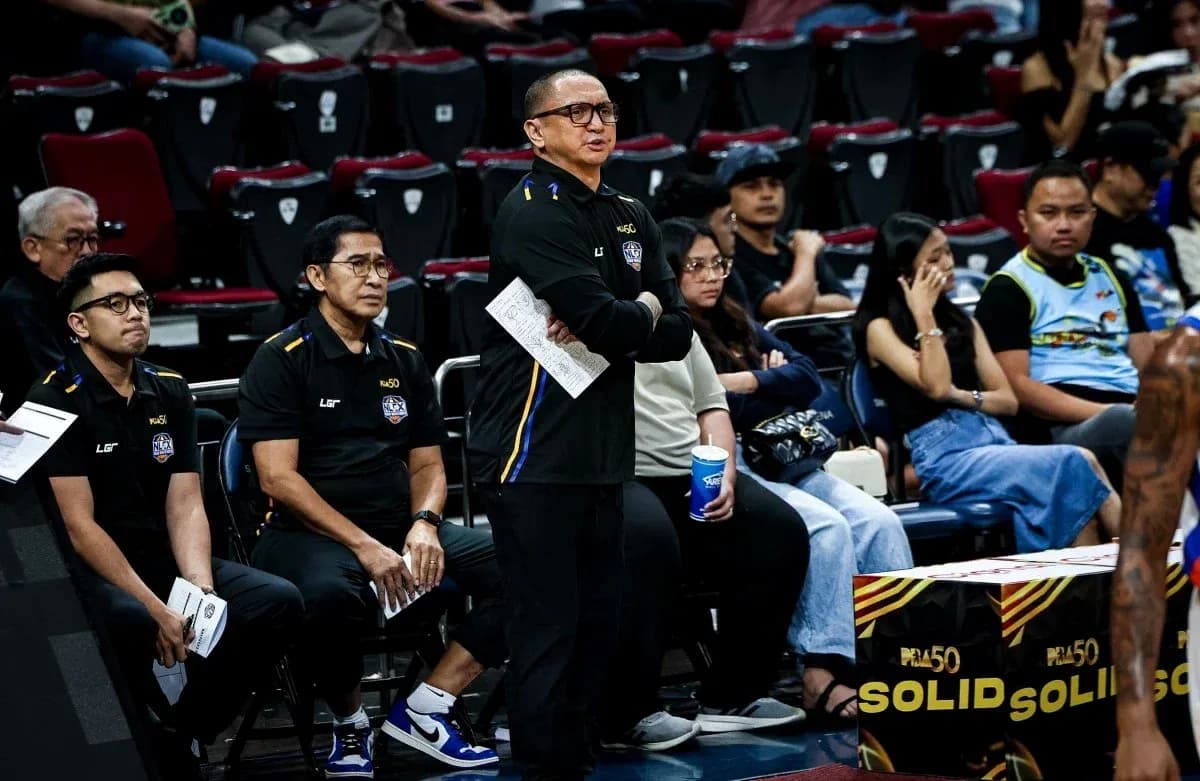 Coaches observing game from the sidelines during match
