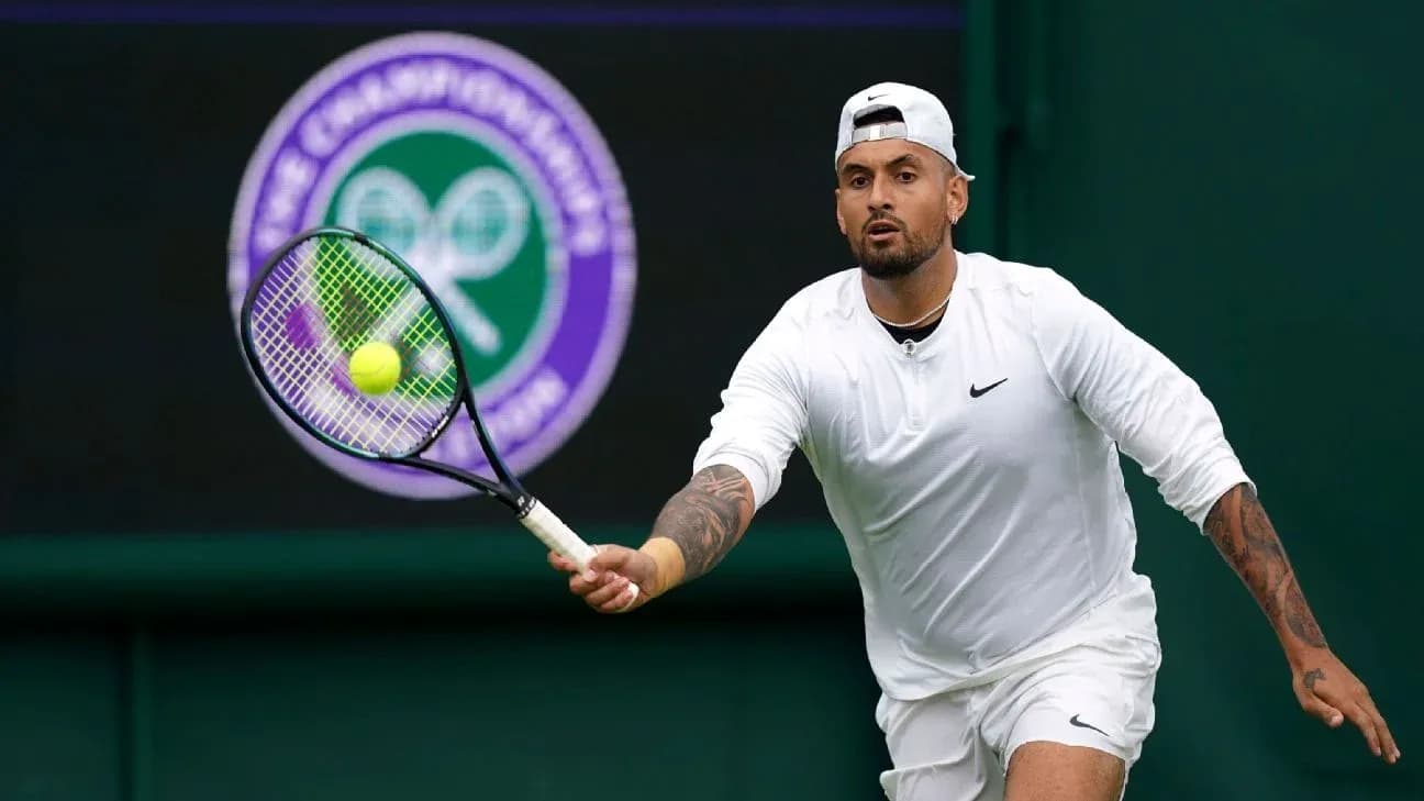 Tennis player hitting a ball at Wimbledon