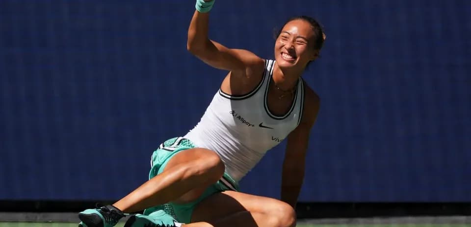 Tennis player celebrating after winning a point