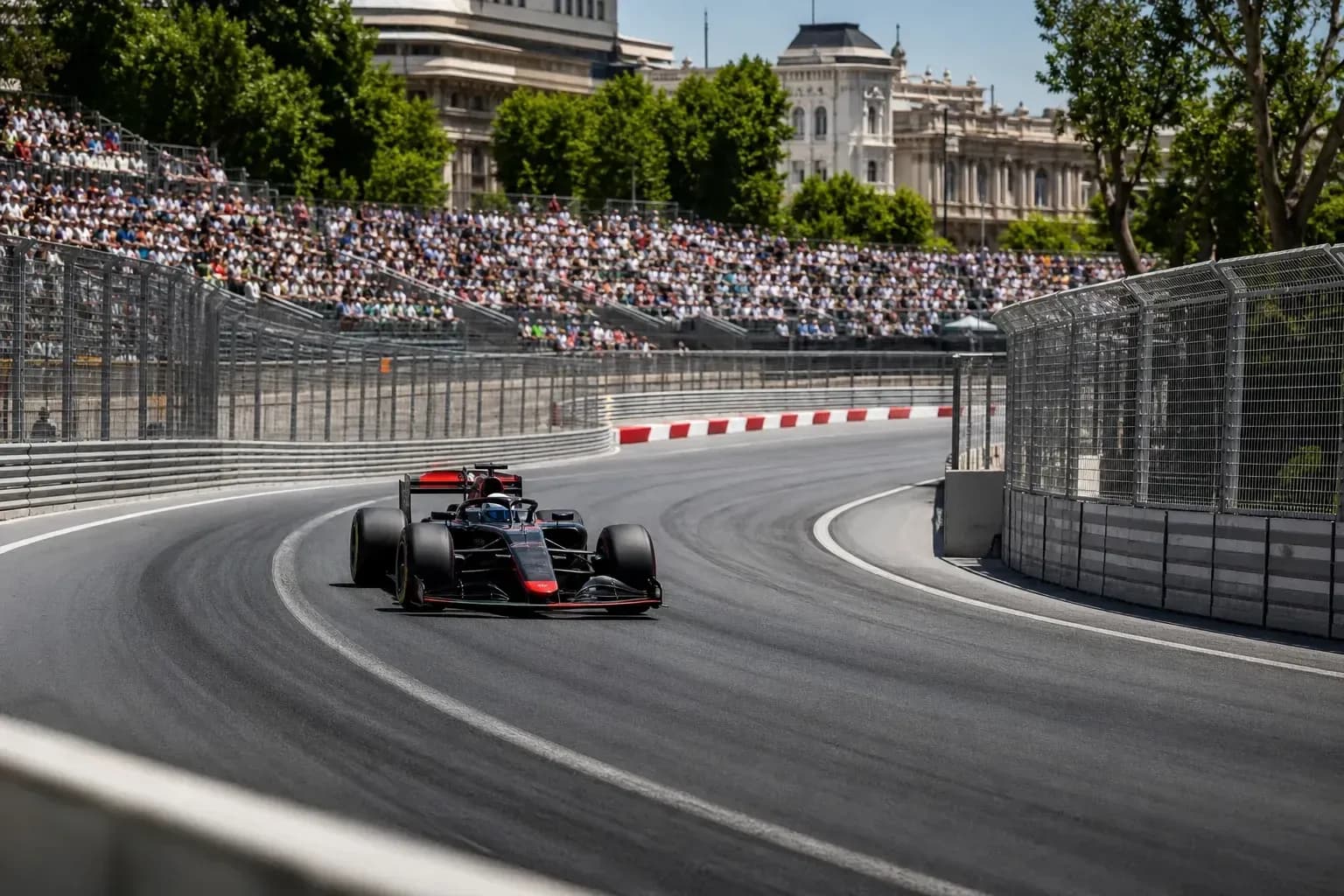 Formula 1 car racing on a curved track
