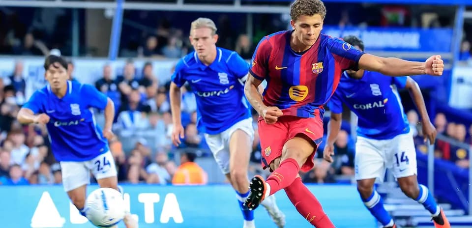 Barcelona player taking a penalty kick against Birmingham