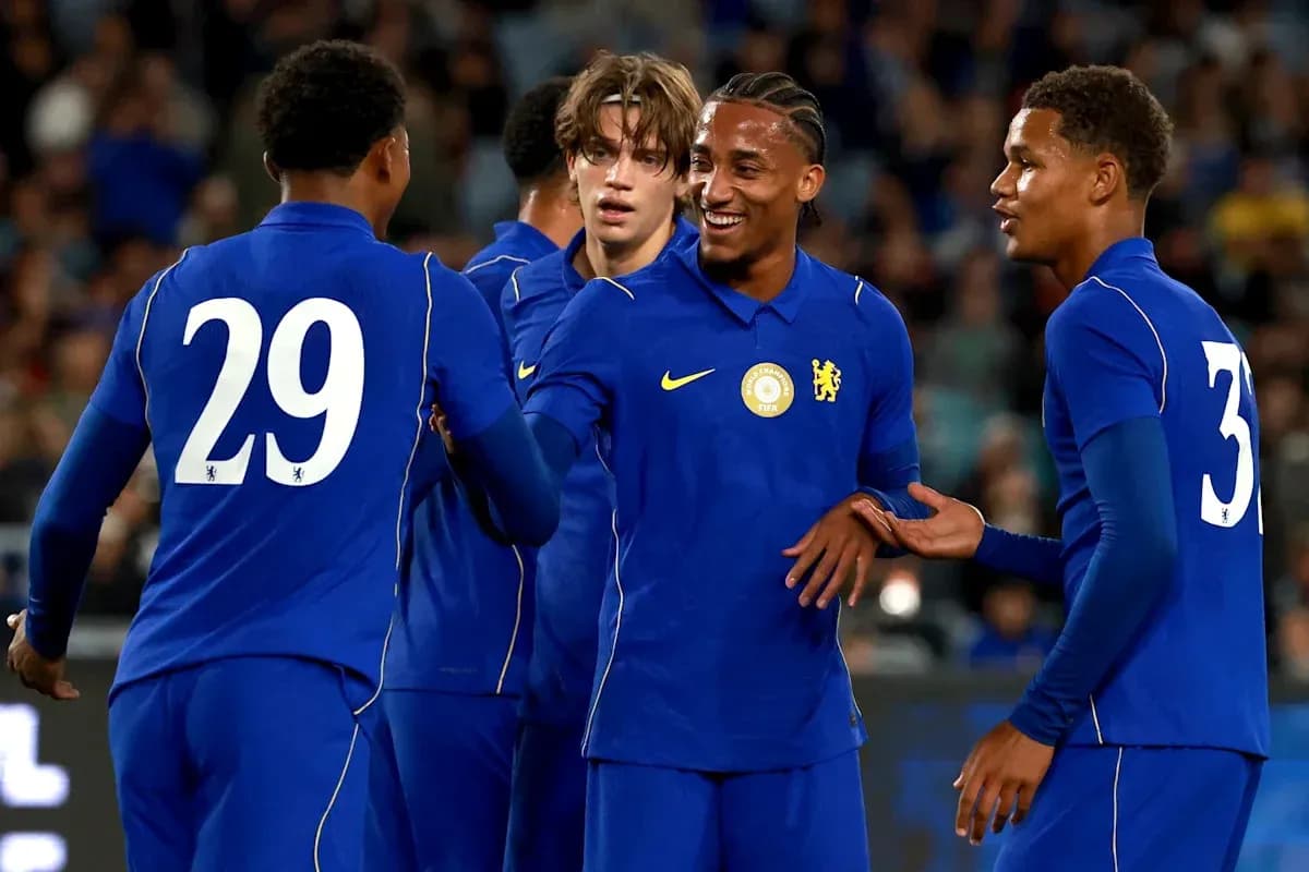 Chelsea players celebrating together on the pitch