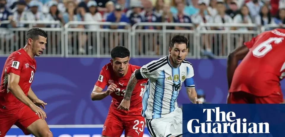 Messi dribbling past defenders during a match