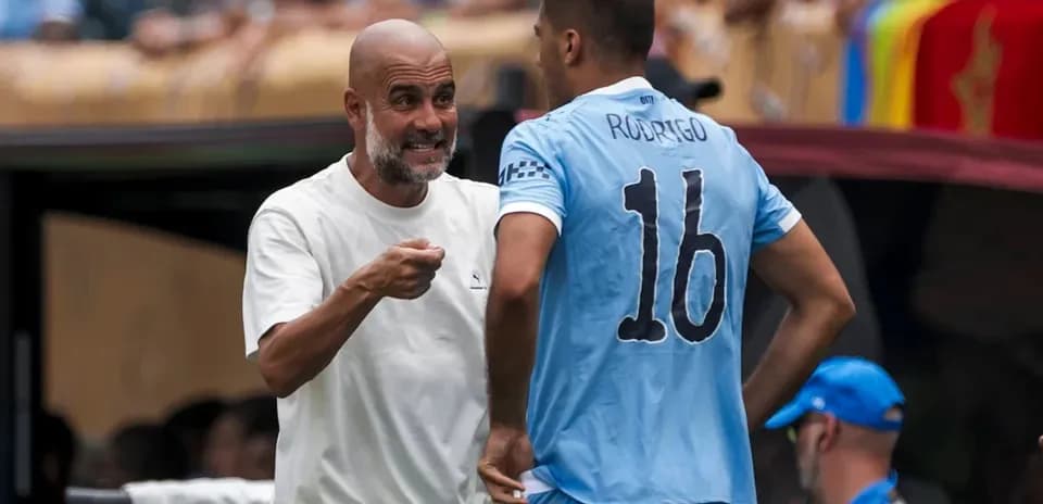 Manager discussing tactics with player during match
