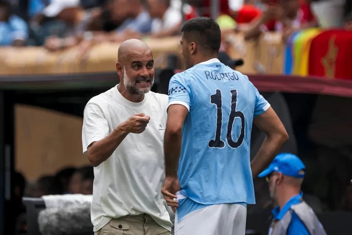 Manager discussing tactics with player during match