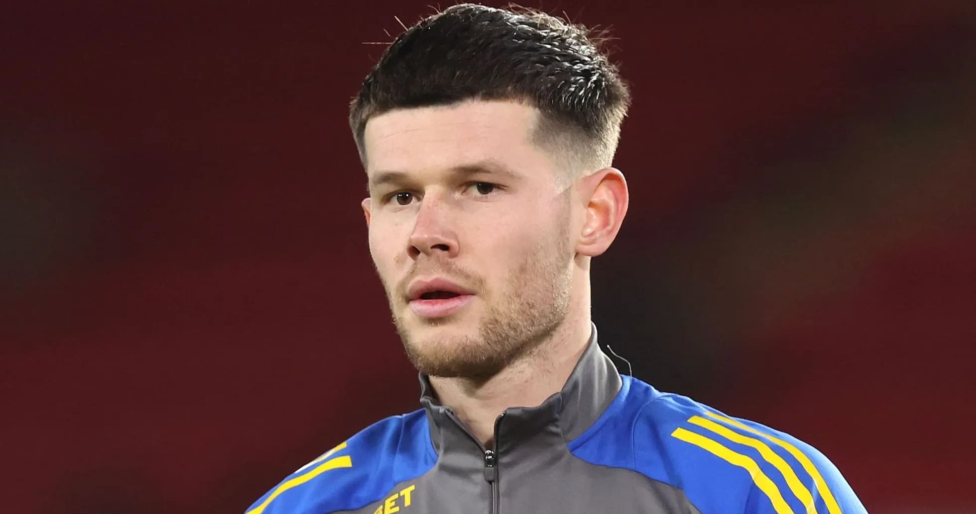 Football player in training gear on pitch