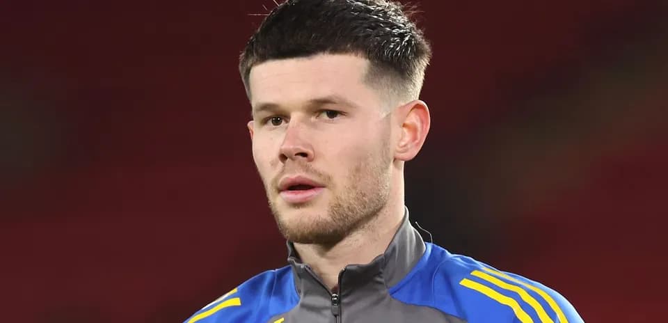 Football player in training gear on pitch