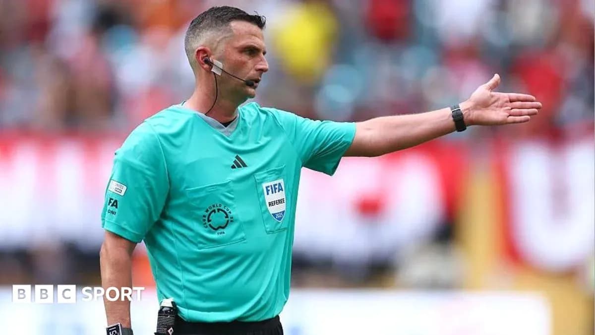 Referee signaling during a football match